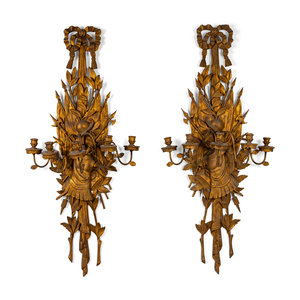 Appraisal: A Pair of Italian Carved Giltwood Six Light Wall Sconces