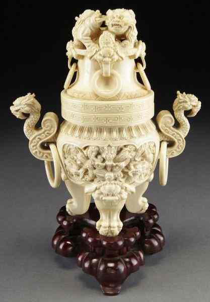 Appraisal: Chinese carved ivory lidded tripod censer International buyers should note