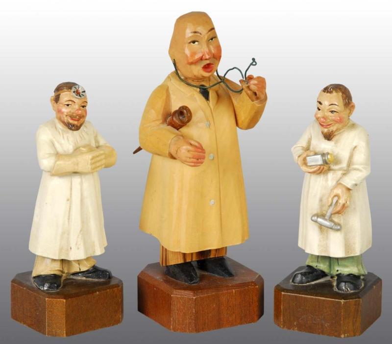 Appraisal: Lot of Carved Wooden Figures of Physicians Condition Excellent Size