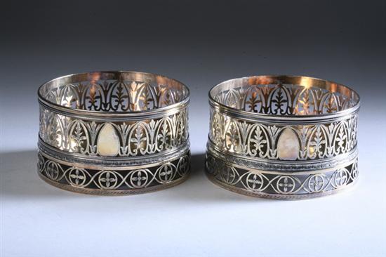 Appraisal: PAIR CONTINENTAL SILVER-GILT WINE COASTERS th century Hanau pseudo marks