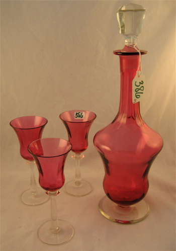 Appraisal: FOUR PIECE CRANBERRY DRINKS SET including a decanter with clear