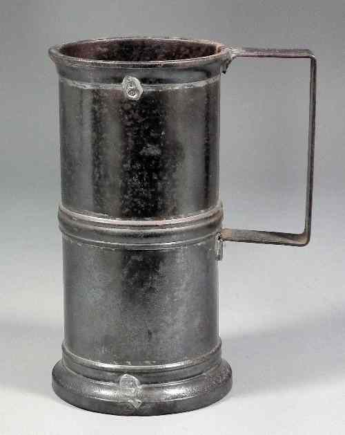 Appraisal: A th Century French tin one litre cylindrical grain measure