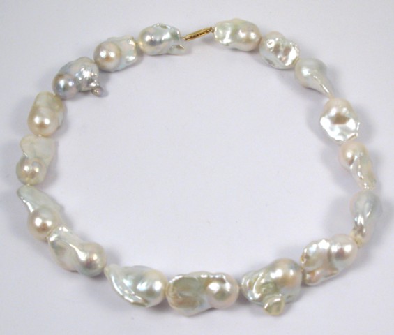 Appraisal: FRESHWATER BAROQUE PEARL NECKLACE strung with white baroque pearls coming