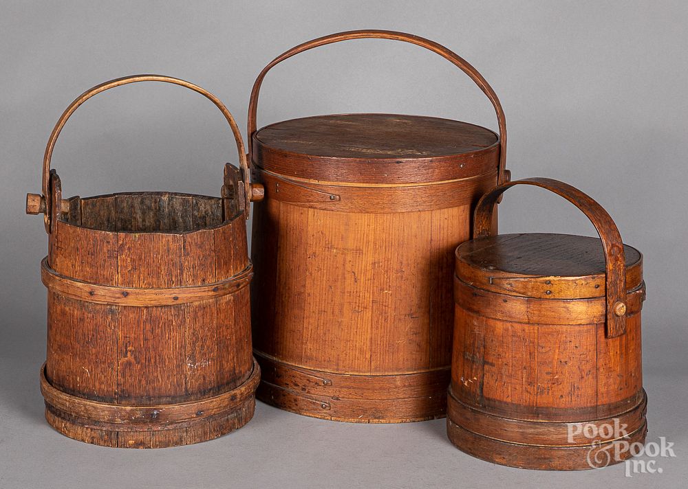 Appraisal: Two firkins and a staved bucket th c Two firkins