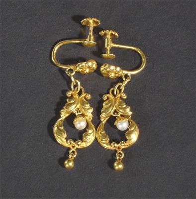 Appraisal: A pair of Georg Jensen gold earrings with seed pearl