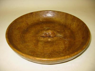 Appraisal: AN ADZED OAK FRUIT BOWL by Robert Mouseman Thompson of