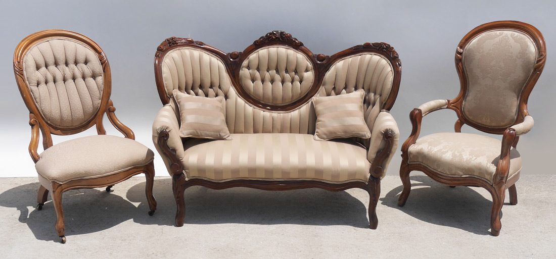 Appraisal: ROCOCO REVIVAL PARLOR SETTEE AND CHAIRS Carved walnut with button