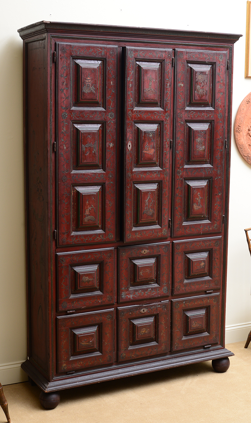 Appraisal: Continental Red Lacquer Wardrobe The upper section with doors with