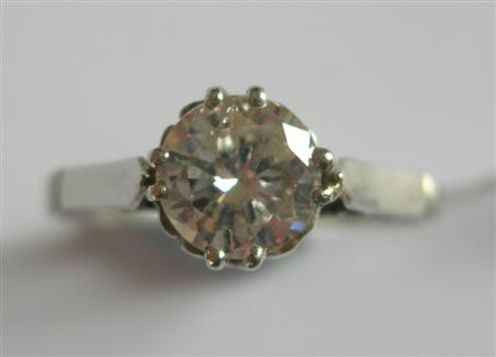 Appraisal: A diamond single-stone ring claw set with a round brilliant