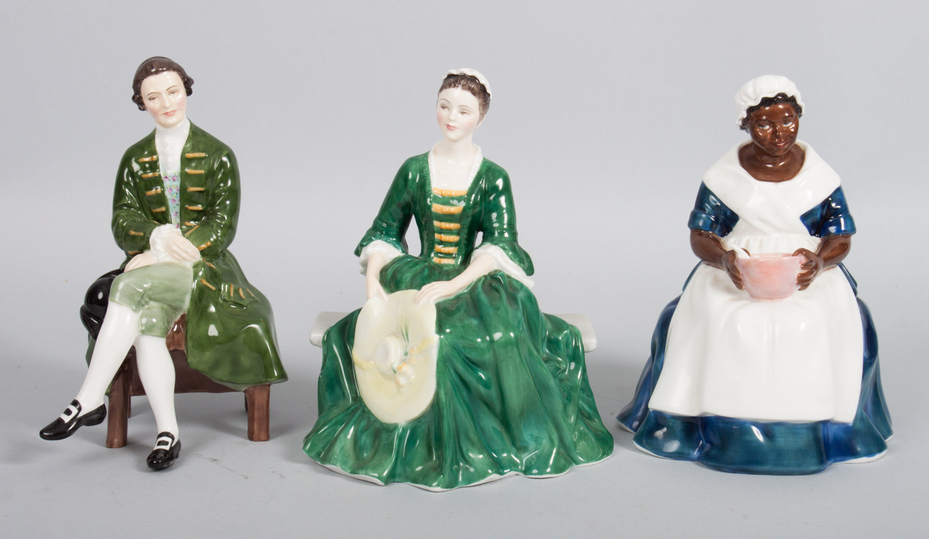 Appraisal: Three Royal Doulton china figurines from the Colonial Williamsburg collection