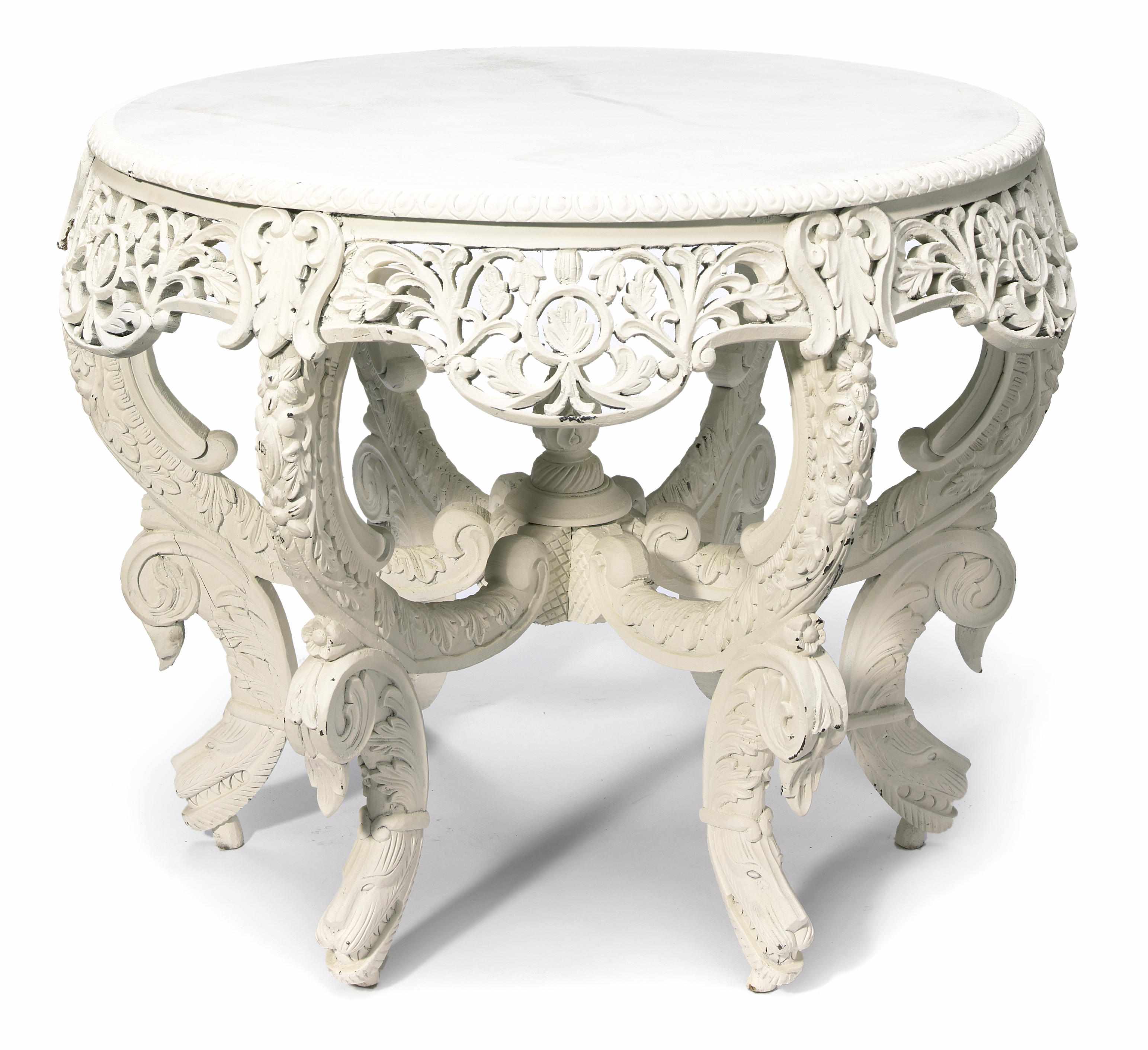 Appraisal: An Anglo Indian white-painted carved wood dining table circa s