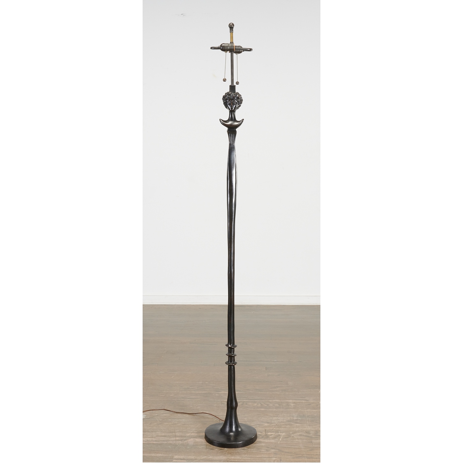 Appraisal: ALBERTO GIACOMETTI AFTER 'TETE DE FEMME' LAMP cast c by