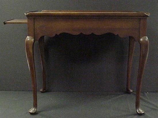 Appraisal: Queen Anne style tea table rectangular top with candleslides shaped