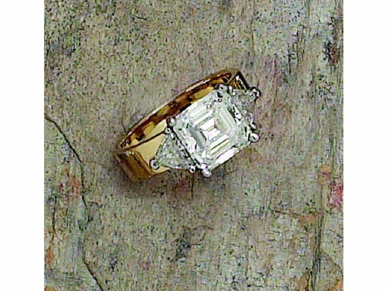 Appraisal: SQUARE EMERALD CUT DIAMOND RING k yellow gold ladies ring