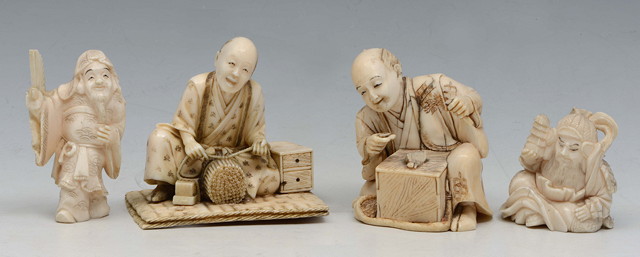 Appraisal: A JAPANESE IVORY OKIMONO seated Artisan signed on inset red