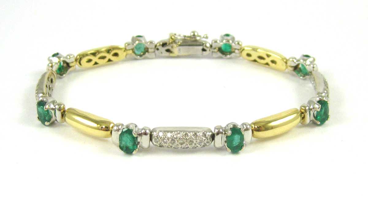 Appraisal: EMERALD DIAMOND AND EIGHTEEN KARAT GOLD BRACELET having eight oval