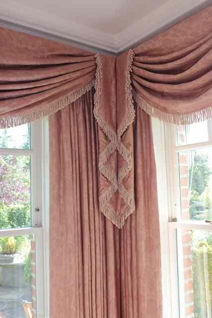 Appraisal: THREE PAIRS OF FITTED PINK SILK CURTAIN AND PELMETS