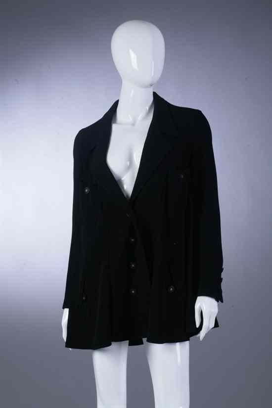 Appraisal: CHANEL BOUTIQUE BLACK KNIT JACKET late s Swing-style with breast