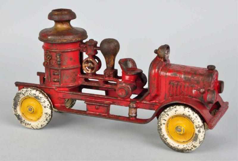 Appraisal: Cast Iron Fire Pumper Truck Toy American Solid disc wheels