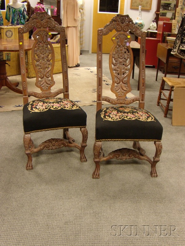 Appraisal: Pair of Continental Baroque-style Needlepoint Upholstered Carved Walnut Hall Chairs