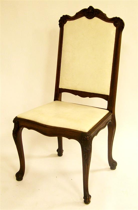 Appraisal: Four Rococo style mahagony chairs ornate foliate backrest cabriole legs