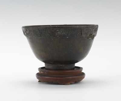 Appraisal: A Chinese Bronze Bowl Small hand made bronze bowl with