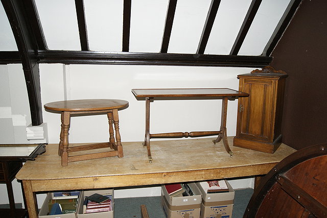 Appraisal: A VICTORIAN WALNUT BEDSIDE CUPBOARD a mahogany rectangular coffee table