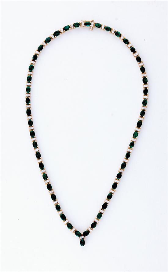 Appraisal: Emerald and gold necklace last half th century oval-cut emeralds