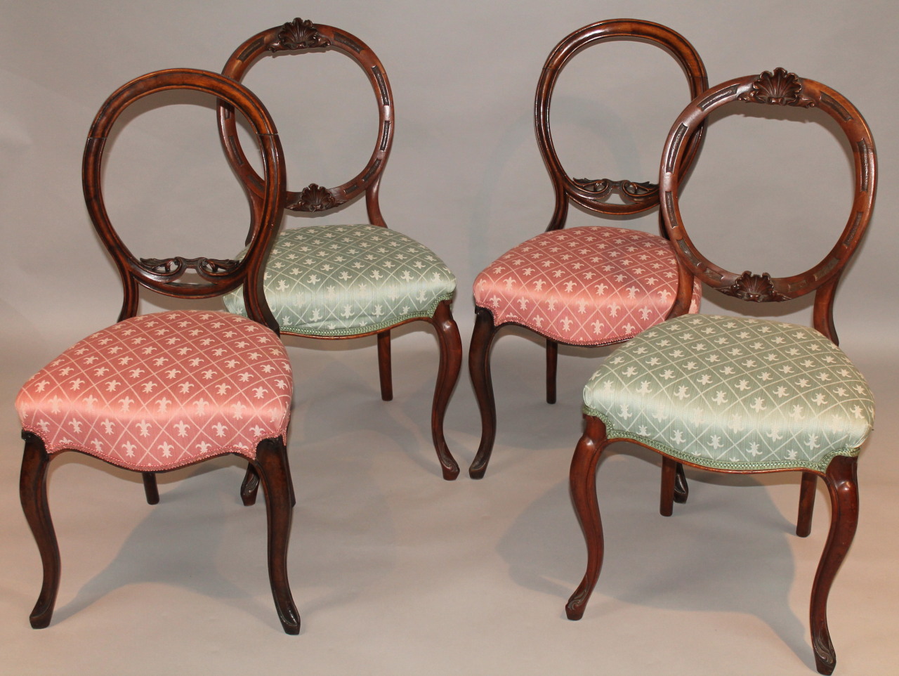 Appraisal: A pair of Victorian mahogany open spoon back dining chairs