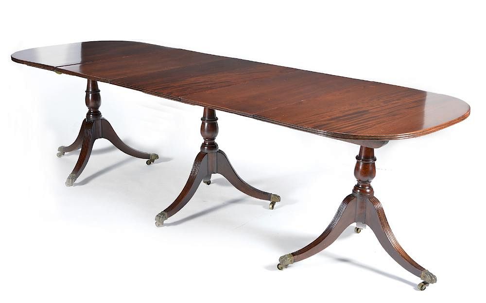 Appraisal: English three pedestal mahogany dining table th c English three