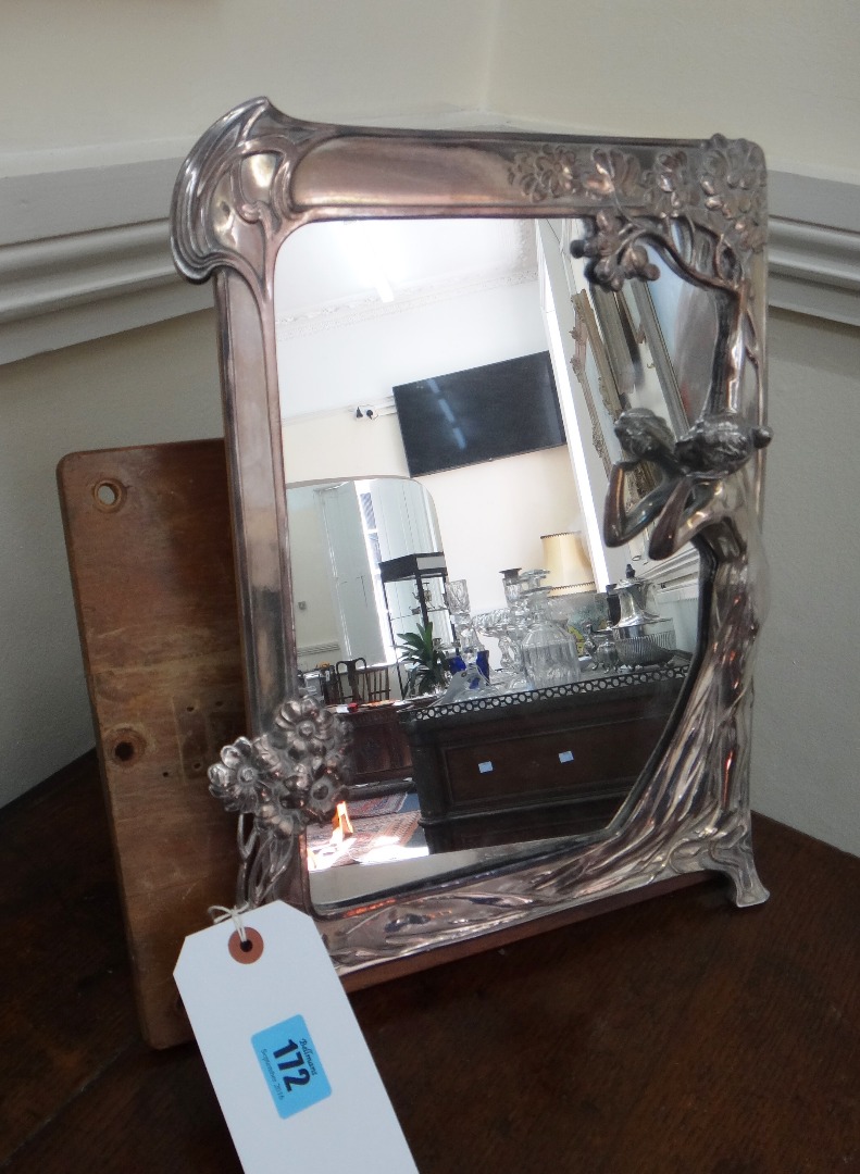 Appraisal: A WMF Art Nouveau plated frame easel back mirror of