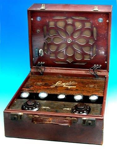 Appraisal: AN AEONIC SUITCASE FIVE PORTABLE RADIO in a brown leather