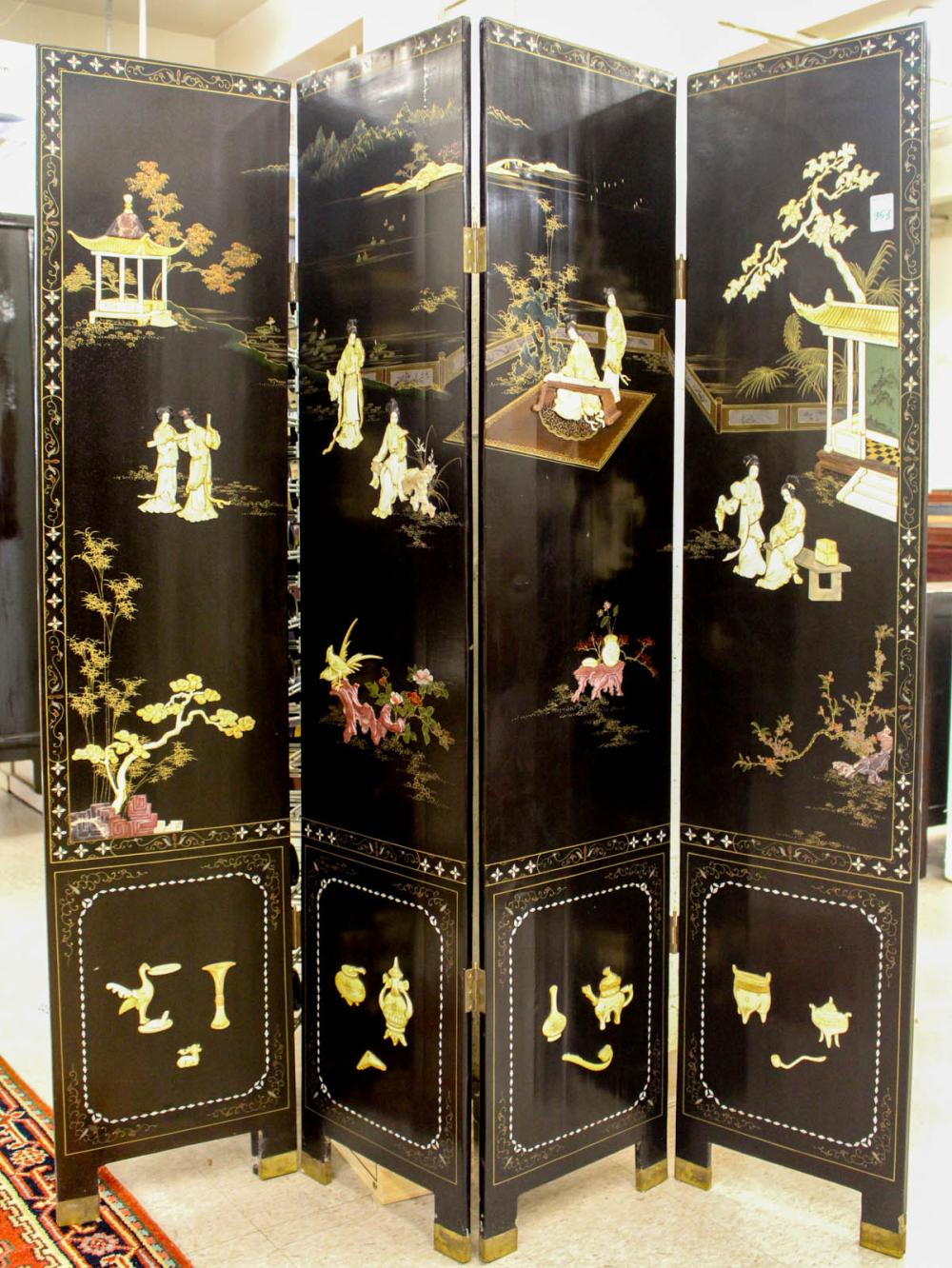 Appraisal: CHINESE FOUR-PANEL FLOOR SCREEN featuring carved bone figures and other