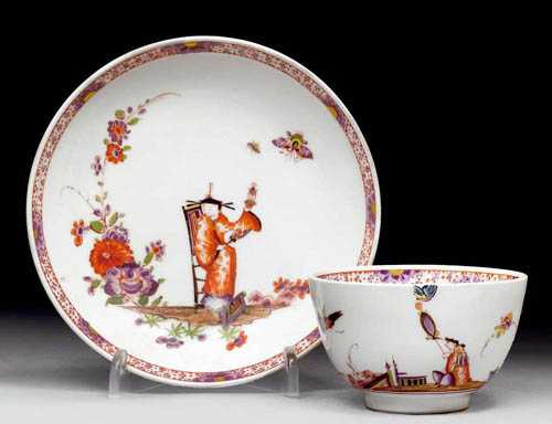 Appraisal: CUP AND SAUCER WITH CHINOISERIE DECORATION Meissen circa In the