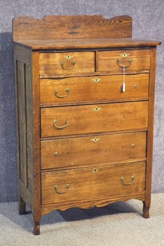 Appraisal: Oak Tall Chest of DrawersTwo-over-four drawers with scalloped backsplash Refinished