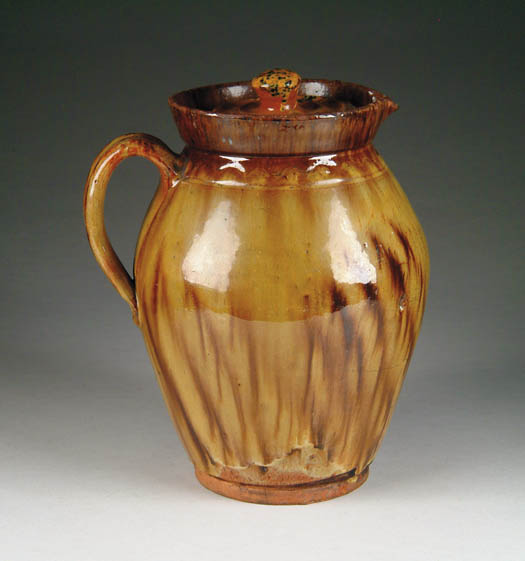 Appraisal: FINE GLAZED REDWARE HANDLED PITCHER WITH COVER Ovoid pitcher with