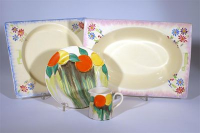 Appraisal: Delecia Citrus' a Clarice Cliff Bizarre milk-jug saucer and side