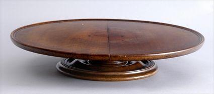 Appraisal: VICTORIAN MAHOGANY LAZY SUSAN The circular molded rotating top on