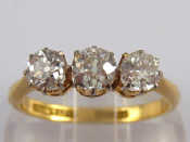 Appraisal: An carat gold and platinum three stone diamond ring the