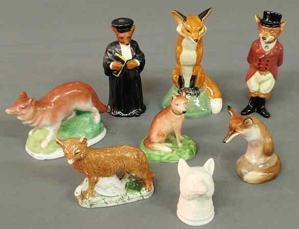 Appraisal: Eight porcelain fox figures including Royal Doulton Struck and Royal