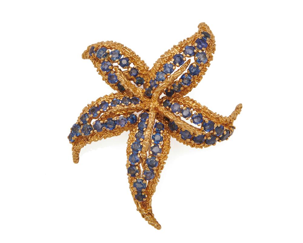 Appraisal: K Gold and Sapphire Brooch the starfish-form brooch featuring circle-cut