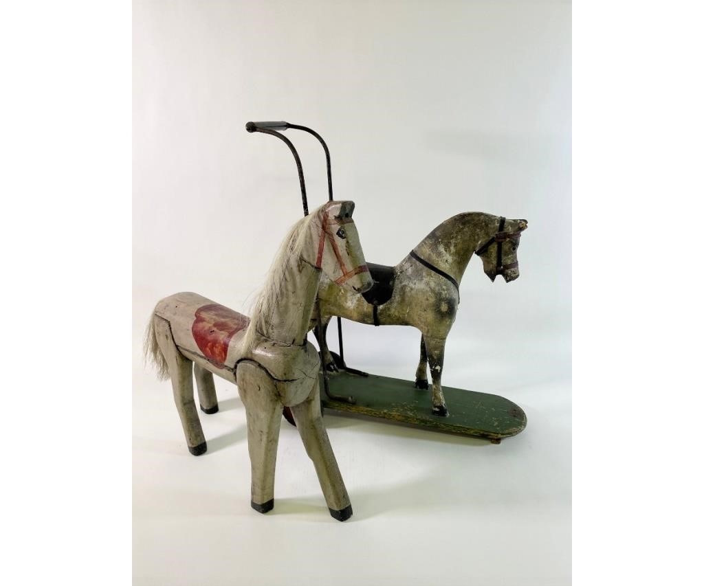 Appraisal: Two childs wood toy horses circa the first with glass