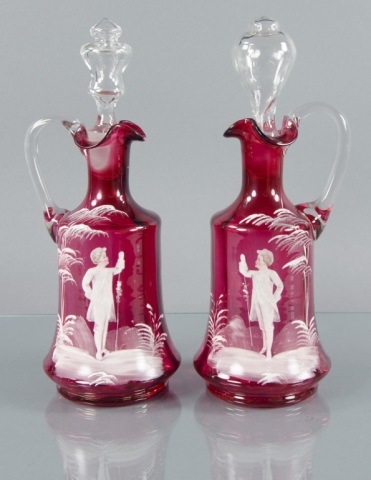 Appraisal: Two Mary Gregory Cranberry EwersEach enameled with a young boy