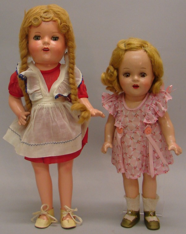 Appraisal: Pair of dolls Unmarked Shirley Temple type with original honey