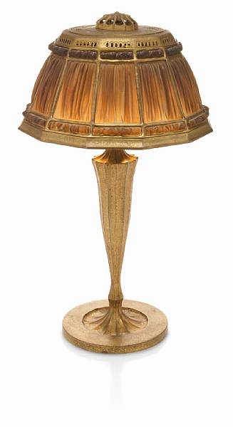 Appraisal: A Tiffany Studios Favrile glass and gilt-bronze linen-fold lamp -