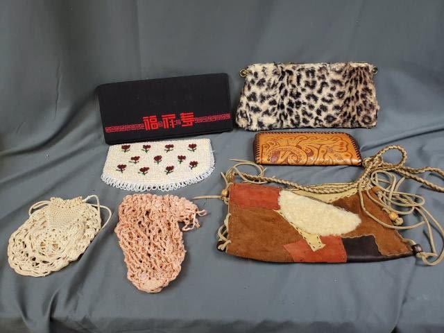 Appraisal: Includes two small antique crocheted purses one in natural and