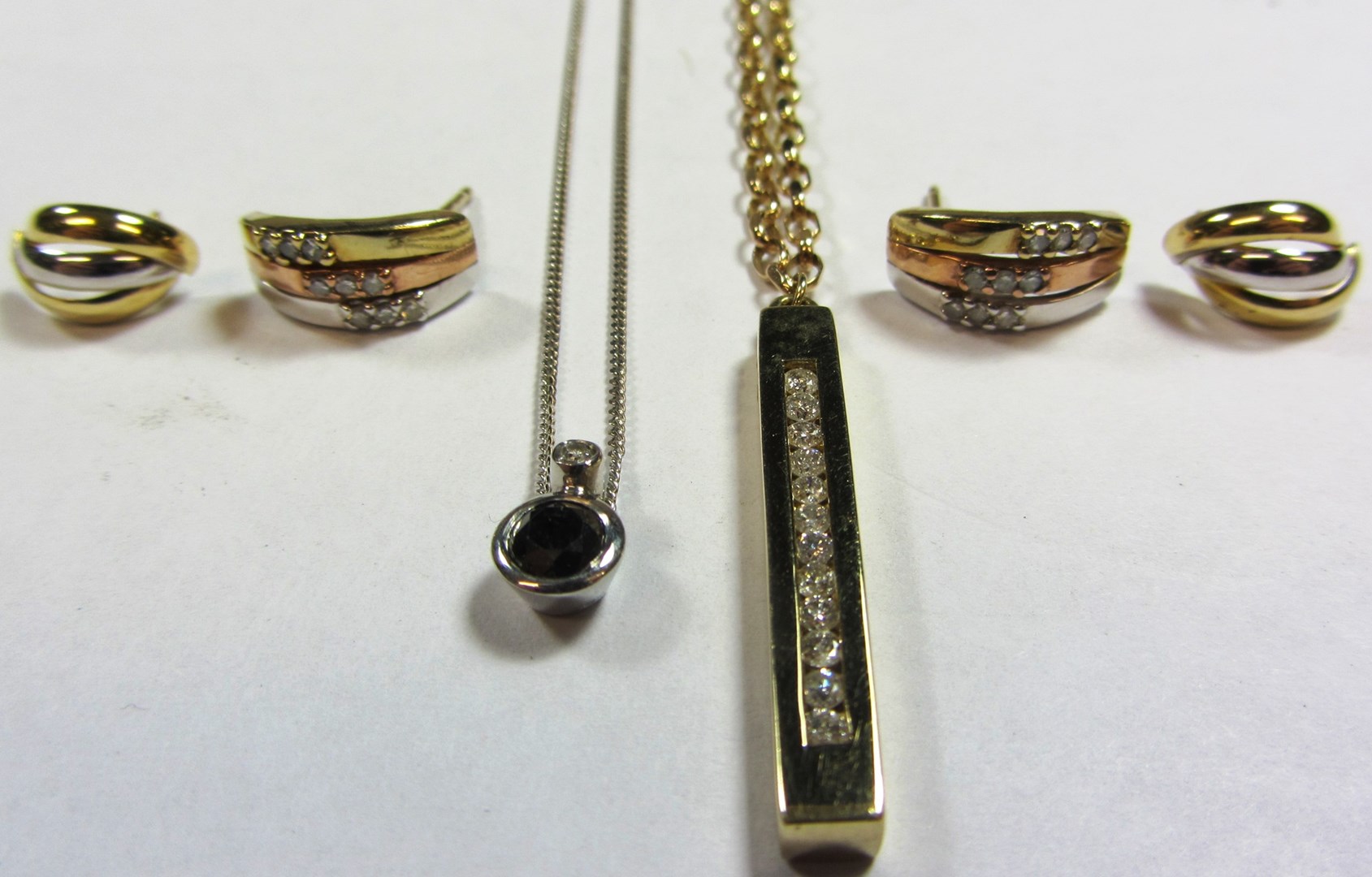 Appraisal: A ct gold and diamond set pendant necklace mounted with