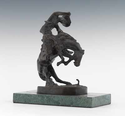 Appraisal: After Frederick Remington Rattlesnake Tabletop Size Cast bronze with brown