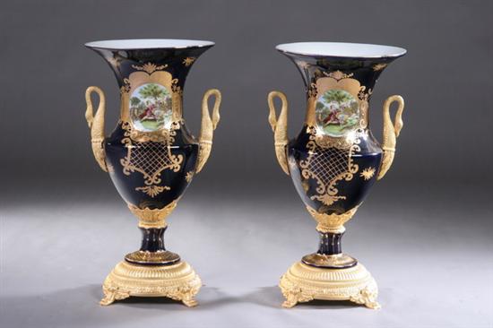 Appraisal: PAIR S VRES-STYLE GILT-METAL MOUNTED COBALT PORCELAIN URNS th century