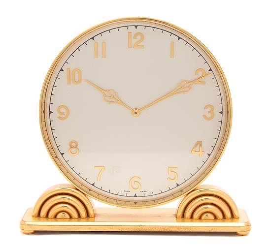 Appraisal: An Art Deco Boxed Brass Boudoir Timepiece Height x width